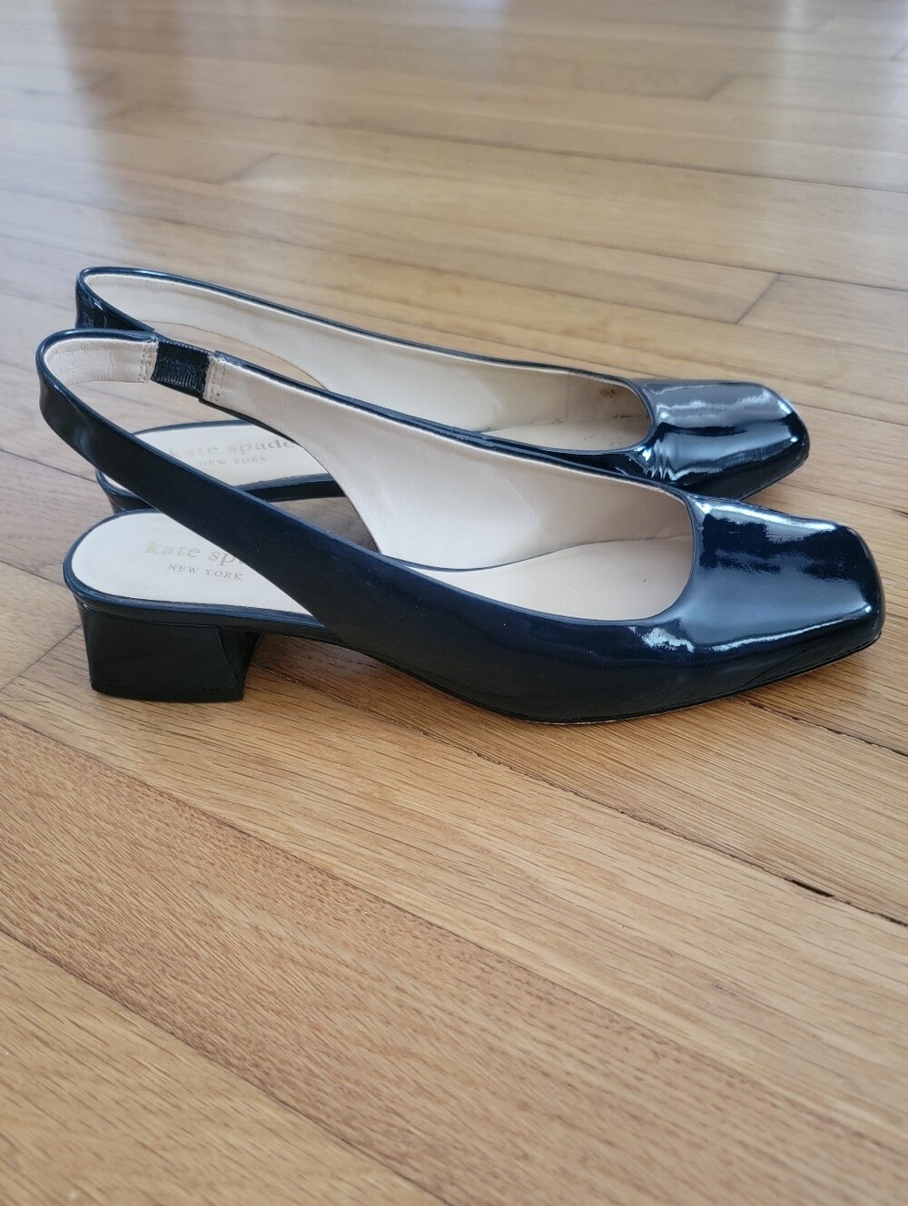 Kate Spade "SAM" slingback in navy patent